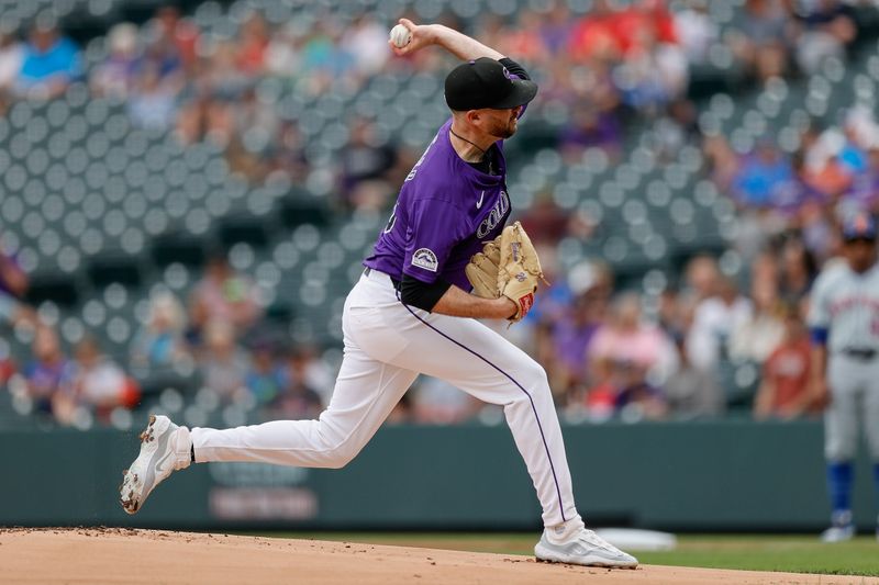 Aug 8, 2024; Denver, Colorado, USA; Colorado Rockies starting pitcher Austin Gomber (26) pitches in the first inning against the New York Mets at Coors Field. Mandatory Credit: Isaiah J. Downing-USA TODAY Sports