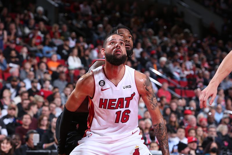 PORTLAND, OR - OCTOBER 26: Caleb Martin #16 of the Miami Heat boxes out during the game against the Portland Trail Blazers  on October 26, 2022 at the Moda Center Arena in Portland, Oregon. NOTE TO USER: User expressly acknowledges and agrees that, by downloading and or using this photograph, user is consenting to the terms and conditions of the Getty Images License Agreement. Mandatory Copyright Notice: Copyright 2022 NBAE (Photo by Sam Forencich/NBAE via Getty Images)