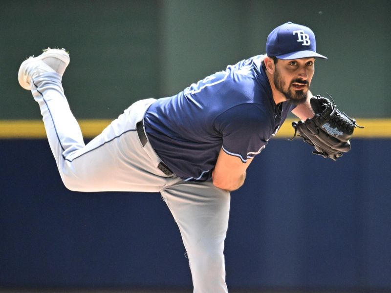 May 1, 2024; Milwaukee, Wisconsin, USA; Tampa Bay Rays starting pitcher Zach Eflin (24) delivers a pitch against the Milwaukee Brewers in the first inning at American Family Field. Mandatory Credit: Michael McLoone-USA TODAY Sports