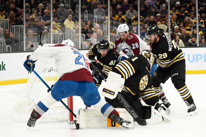 Jan 18, 2024; Boston, Massachusetts, USA; Colorado Avalanche center Nathan MacKinnon (29) scores a goal past Boston Bruins goaltender Jeremy Swayman (1) during the second period at TD Garden. Mandatory Credit: Bob DeChiara-USA TODAY Sports