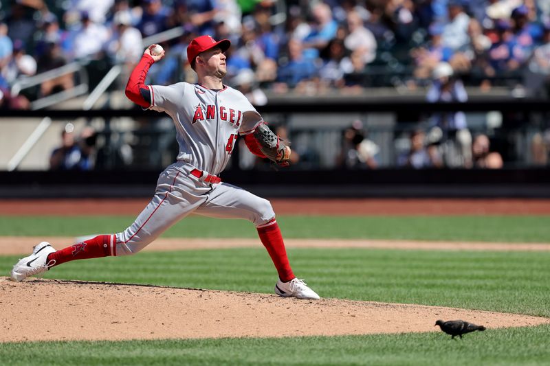 Aug 27, 2023; New York City, New York, USA; Los Angeles Angels starting pitcher Griffin Canning (47) pitches against the New York Mets with a pigeon in the area of the pitchers mound during the seventh inning at Citi Field. Mandatory Credit: Brad Penner-USA TODAY Sports