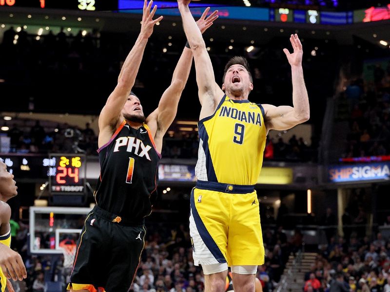 INDIANAPOLIS, INDIANA - JANUARY 26: Devin Booker #1 of the Phoenix Suns and T.J. McConnell #9 of the Indiana Pacers reach for a rebound during the first half of the Pacers 133-131 win at Gainbridge Fieldhouse on January 26, 2024 in Indianapolis, Indiana.    NOTE TO USER: User expressly acknowledges and agrees that, by downloading and or using this photograph, User is consenting to the terms and conditions of the Getty Images License Agreement.  (Photo by Andy Lyons/Getty Images)