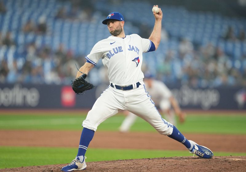 Jun 29, 2023; Toronto, Ontario, CAN; Toronto Blue Jays relief pitcher Tim Mayza (58) throws a pitch against the San Francisco Giants during the eighth inning at Rogers Centre. Mandatory Credit: Nick Turchiaro-USA TODAY Sports