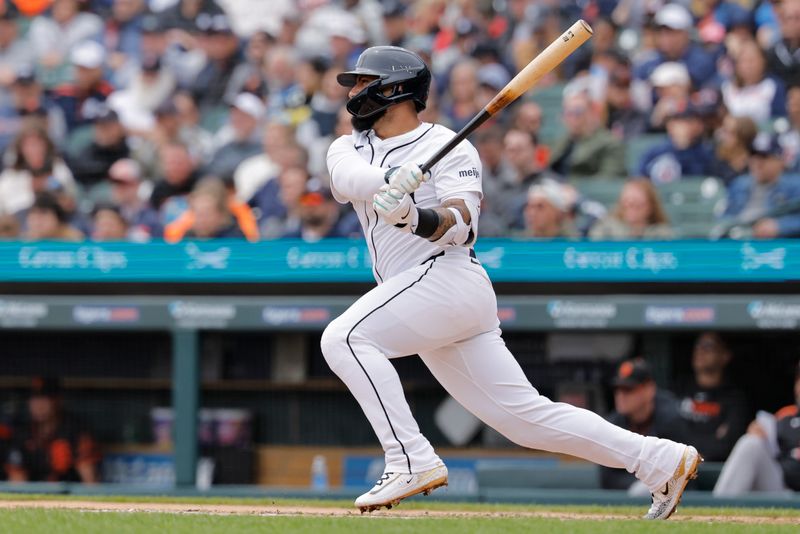 May 28, 2025; Detroit, Michigan, USA;  Detroit Tigers second base Gleyber Torres (25) hits a single in the third inning against the San Francisco Giants at Comerica Park. Mandatory Credit: Rick Osentoski-Imagn Images