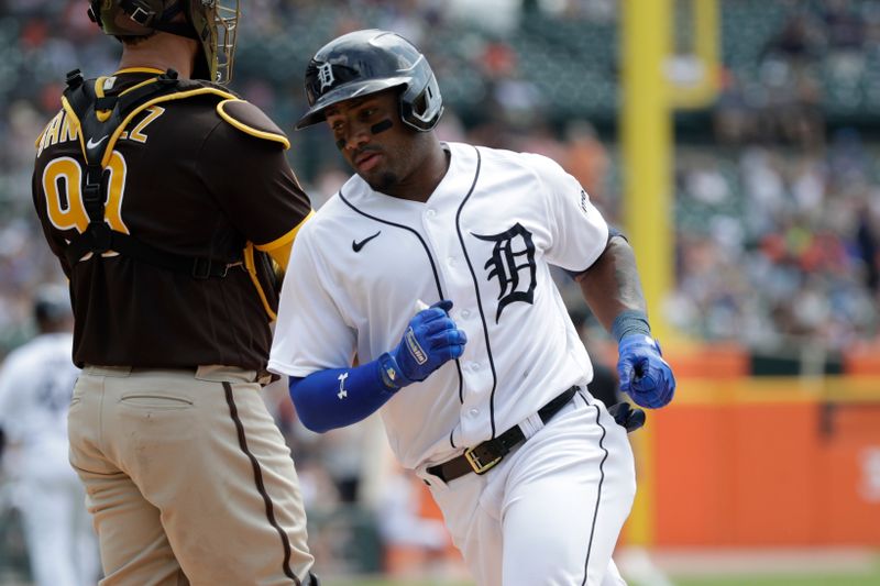 Jul 23, 2023; Detroit, Michigan, USA; Detroit Tigers infielder Andy Ib    ez (77) hits a home run during the game against the San Diego Padres at Comerica Park. Mandatory Credit: Brian Bradshaw Sevald-USA TODAY Sports