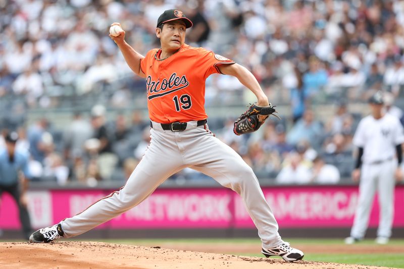 Sep 27, 2025; Bronx, New York, USA;  Baltimore Orioles starting pitcher Tomoyuki Sugano (19) pitches in the first inning against the New York Yankees at Yankee Stadium. Mandatory Credit: Wendell Cruz-Imagn Images