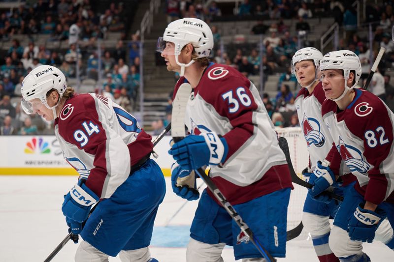 Oct 20, 2024; San Jose, California, USA; Colorado Avalanche left wing Joel Kiviranta (94) skates to the bench with center Matt Stienburg (36) and center Ivan Ivan (82) after scoring a goal against the San Jose Sharks during the third period at SAP Center at San Jose. Mandatory Credit: Robert Edwards-Imagn Images