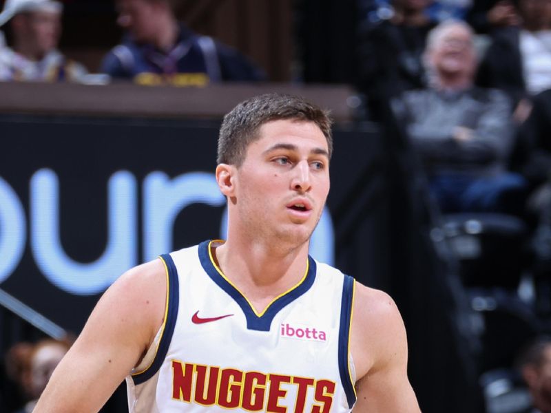 SALT LAKE CITY, UT - JANUARY 10: Collin Gillespie #21 of the Denver Nuggets brings the ball up court against the Utah Jazz on January 10, 2024 at Delta Center in Salt Lake City, Utah. NOTE TO USER: User expressly acknowledges and agrees that, by downloading and or using this Photograph, User is consenting to the terms and conditions of the Getty Images License Agreement. Mandatory Copyright Notice: Copyright 2024 NBAE (Photo by Melissa Majchrzak/NBAE via Getty Images)