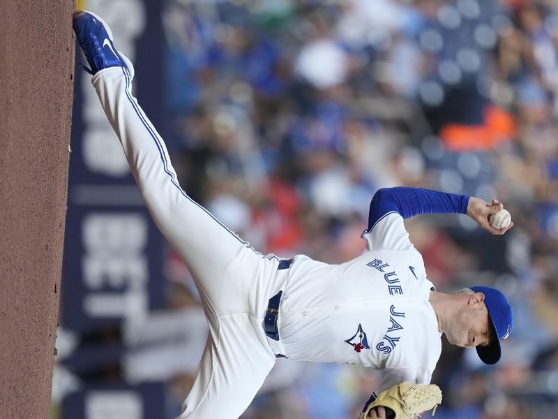 Jun 4, 2024; Toronto, Ontario, CAN; Toronto Blue Jays starting pitcher Trevor Richards (33) pitches to the Baltimore Orioles during the first inning at Rogers Centre. Mandatory Credit: John E. Sokolowski-USA TODAY Sports