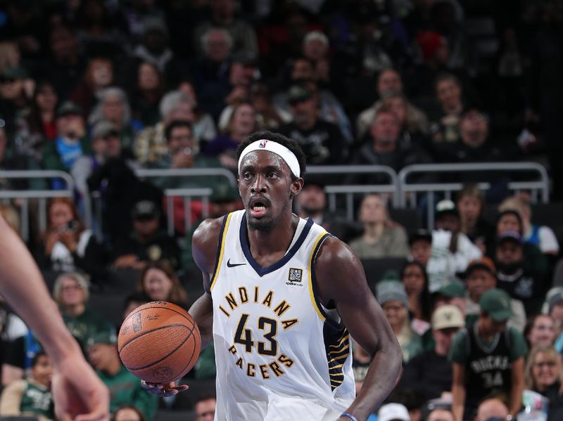 MILWAUKEE, WI - NOVEMBER 22: Pascal Siakam #43 of the Indiana Pacers dribbles the ball during the game against the Milwaukee Bucks  during a Emirates NBA Cup on November 22, 2024 at Fiserv Forum Center in Milwaukee, Wisconsin. NOTE TO USER: User expressly acknowledges and agrees that, by downloading and or using this Photograph, user is consenting to the terms and conditions of the Getty Images License Agreement. Mandatory Copyright Notice: Copyright 2024 NBAE (Photo by Gary Dineen/NBAE via Getty Images).