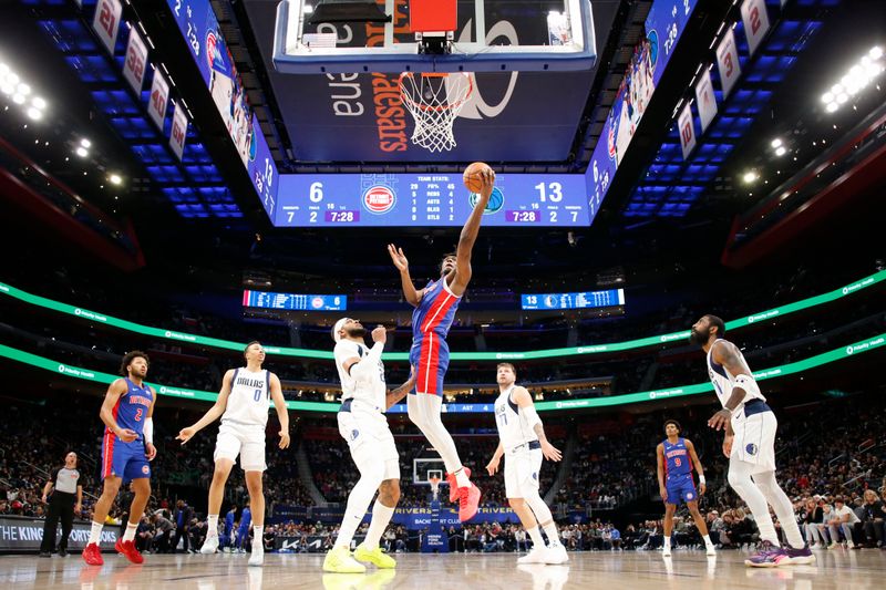 DETROIT, MI - MARCH 9: James Wiseman #13 of the Detroit Pistons drives to the basket during the game against the Dallas Mavericks on March 9, 2024 at Little Caesars Arena in Detroit, Michigan. NOTE TO USER: User expressly acknowledges and agrees that, by downloading and/or using this photograph, User is consenting to the terms and conditions of the Getty Images License Agreement. Mandatory Copyright Notice: Copyright 2024 NBAE (Photo by Brian Sevald/NBAE via Getty Images)