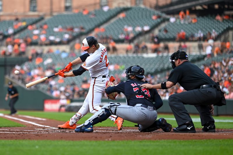 Jun 25, 2024; Baltimore, Maryland, USA;  Baltimore Orioles shortstop Gunnar Henderson (2) hits a two run home run against the Cleveland Guardians dueling the first inning at Oriole Park at Camden Yards. Mandatory Credit: Tommy Gilligan-USA TODAY Sports