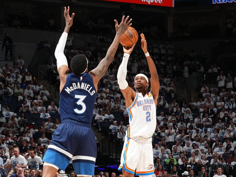 MINNEAPOLIS, MN -  MAY 24: Shai Gilgeous-Alexander #2 of the Oklahoma City Thunder shoots a three point basket during the game against the Minnesota Timberwolves  during Game 3 of the 2025 NBA Western Conference Finals on May 24, 2025 at Target Center in Minneapolis, Minnesota. NOTE TO USER: User expressly acknowledges and agrees that, by downloading and or using this Photograph, user is consenting to the terms and conditions of the Getty Images License Agreement. Mandatory Copyright Notice: Copyright 2025 NBAE (Photo by Jesse D. Garrabrant/NBAE via Getty Images)