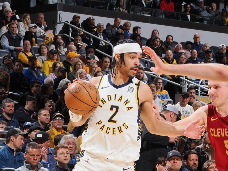 INDIANAPOLIS, IN - MARCH 18:  Andrew Nembhard #2 of the Indiana Pacers handles the ball during the game  on March 18, 2024 at Gainbridge Fieldhouse in Indianapolis, Indiana. NOTE TO USER: User expressly acknowledges and agrees that, by downloading and or using this Photograph, user is consenting to the terms and conditions of the Getty Images License Agreement. Mandatory Copyright Notice: Copyright 2024 NBAE (Photo by Ron Hoskins/NBAE via Getty Images)