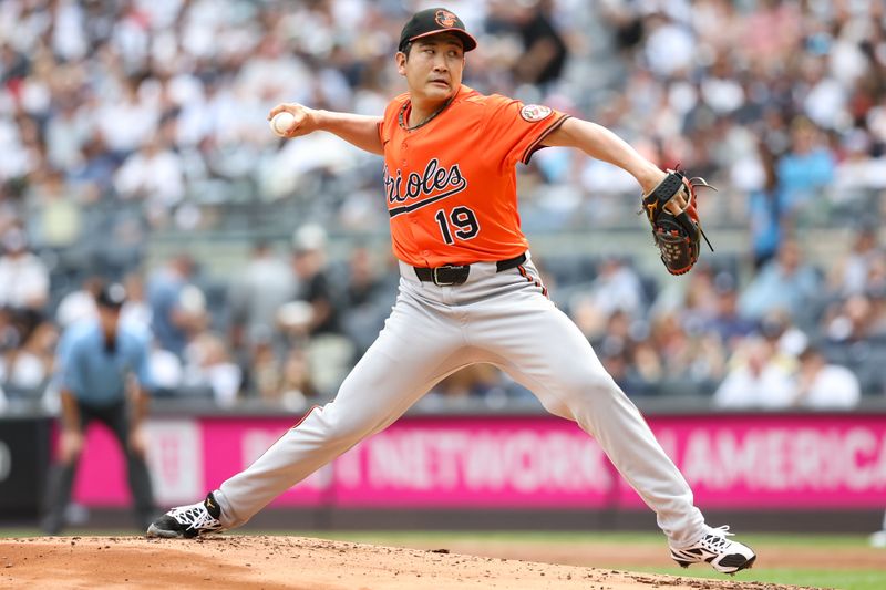 Sep 27, 2025; Bronx, New York, USA;  Baltimore Orioles starting pitcher Tomoyuki Sugano (19) pitches in the first inning against the New York Yankees at Yankee Stadium. Mandatory Credit: Wendell Cruz-Imagn Images