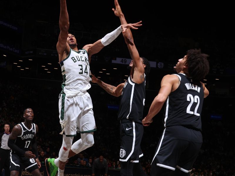 BROOKLYN, NY - DECEMBER 8: Giannis Antetokounmpo #34 of the Milwaukee Bucks shoots the ball during the game against the Brooklyn Nets on December 8, 2024 at Barclays Center in Brooklyn, New York. NOTE TO USER: User expressly acknowledges and agrees that, by downloading and or using this Photograph, user is consenting to the terms and conditions of the Getty Images License Agreement. Mandatory Copyright Notice: Copyright 2024 NBAE (Photo by Nathaniel S. Butler/NBAE via Getty Images)