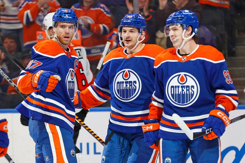 Jan 2, 2024; Edmonton, Alberta, CAN; The Edmonton Oilers celebrate a goal scored by forward Connor McDavid (97) against the Philadelphia Flyers during the first period at Rogers Place. Mandatory Credit: Perry Nelson-USA TODAY Sports