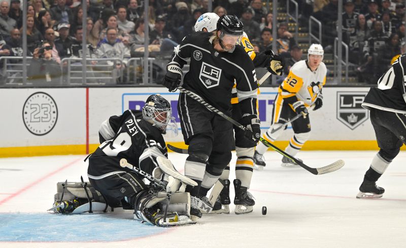 Feb 11, 2023; Los Angeles, California, USA;  Los Angeles Kings defenseman Alexander Edler (2) blocks out Pittsburgh Penguins left wing Jason Zucker (16) as Los Angeles Kings goaltender Pheonix Copley (29) pokes the puck away from the goal in the third period at Crypto.com Arena.  Mandatory Credit: Jayne Kamin-Oncea-USA TODAY Sports