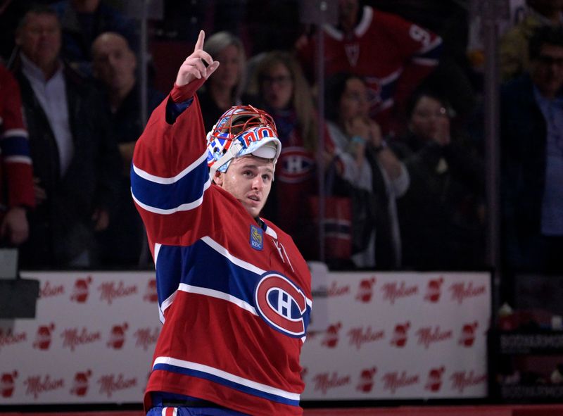 Oct 20, 2025; Montreal, Quebec, CAN; Montreal Canadiens goalie Jakub Dobes (75) celebrates the win against the Buffalo Sabres at the Bell Centre. Mandatory Credit: Eric Bolte-Imagn Images