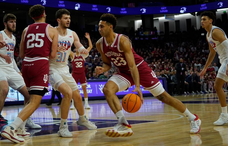 Feb 15, 2023; Evanston, Illinois, USA; Indiana Hoosiers forward Trayce Jackson-Davis (23) drives on Northwestern Wildcats forward Robbie Beran (31) during the first half at Welsh-Ryan Arena. Mandatory Credit: David Banks-USA TODAY Sports