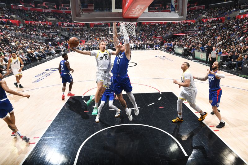 LOS ANGELES, CA - APRIL 12: Jason Preston #10 of the Utah Jazz drives to the basket during the game against the LA Clippers on April 12, 2024 at Crypto.Com Arena in Los Angeles, California. NOTE TO USER: User expressly acknowledges and agrees that, by downloading and/or using this Photograph, user is consenting to the terms and conditions of the Getty Images License Agreement. Mandatory Copyright Notice: Copyright 2024 NBAE (Photo by Adam Pantozzi/NBAE via Getty Images)