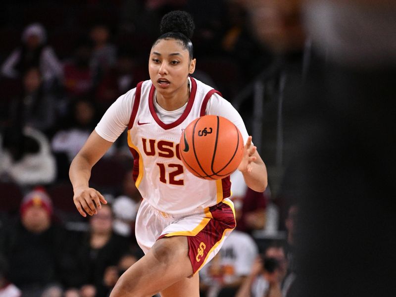 Jan 12, 2025; Los Angeles, California, USA; USC Trojans guard JuJu Watkins (12) drives the basketball down the court during the third quarter against the Penn State Nittany Lions at Galen Center. Mandatory Credit: Robert Hanashiro-Imagn Images