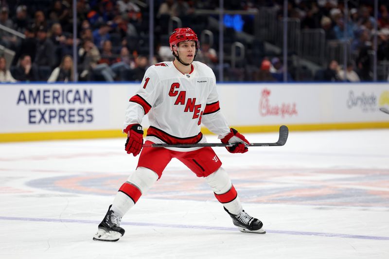 Jan 25, 2025; Elmont, New York, USA; Carolina Hurricanes left wing Taylor Hall (71) skates against the New York Islanders during the first period at UBS Arena. Mandatory Credit: Brad Penner-Imagn Images