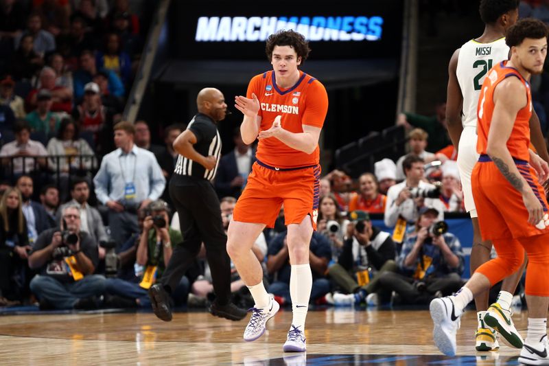 Mar 24, 2024; Memphis, TN, USA; Clemson Tigers forward Ian Schieffelin (4) celebrates in the first half against the Baylor Bears in the second round of the 2024 NCAA Tournament at FedExForum. Mandatory Credit: Petre Thomas-USA TODAY Sports