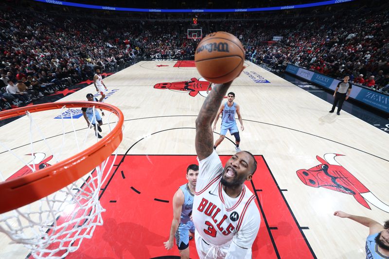 CHICAGO, IL - JANUARY 20: Andre Drummond #3 of the Chicago Bulls dunks the ball during the game against the Memphis Grizzlies on January 20, 2024 at United Center in Chicago, Illinois. NOTE TO USER: User expressly acknowledges and agrees that, by downloading and or using this photograph, User is consenting to the terms and conditions of the Getty Images License Agreement. Mandatory Copyright Notice: Copyright 2024 NBAE (Photo by Jeff Haynes/NBAE via Getty Images)