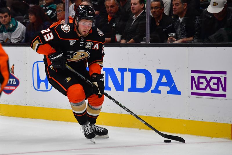 Oct 19, 2023; Anaheim, California, USA; Anaheim Ducks center Mason McTavish (23) moves the puck against the Dallas Stars during the second period at Honda Center. Mandatory Credit: Gary A. Vasquez-USA TODAY Sports