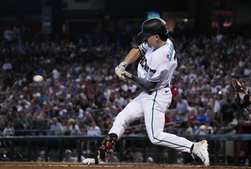 Jul 30, 2023; Phoenix, Arizona, USA; Arizona Diamondbacks left fielder Corbin Carroll (7) bats against the Seattle Mariners during the first inning at Chase Field. Mandatory Credit: Joe Camporeale-USA TODAY Sports