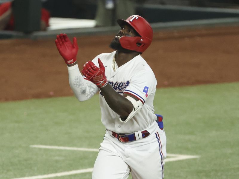 Jun 28, 2023; Arlington, Texas, USA;  Texas Rangers right fielder Adolis Garcia (53) celebrates after hitting a two-run home run during the sixth inning against the Detroit Tigers at Globe Life Field. Mandatory Credit: Kevin Jairaj-USA TODAY Sports