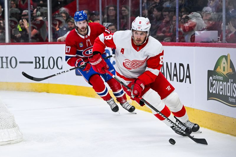 Dec 2, 2023; Montreal, Quebec, CAN; Detroit Red Wings defenseman Ben Chiarot (8) skates away with the puck during the first period at Bell Centre. Mandatory Credit: David Kirouac-USA TODAY Sports