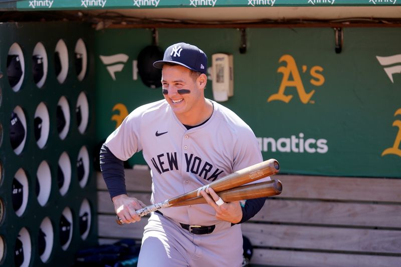 Sep 22, 2024; Oakland, California, USA; New York Yankees first baseman Anthony Rizzo (48) walks onto the field before the start of the game against the Oakland Athletics at the Oakland-Alameda County Coliseum. Mandatory Credit: Cary Edmondson-Imagn Images