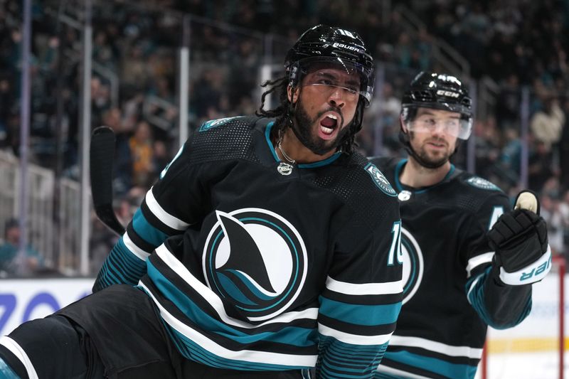 Feb 17, 2024; San Jose, California, USA; San Jose Sharks left wing Anthony Duclair (10) reacts after scoring a goal against the Columbus Blue Jackets during the second period at SAP Center at San Jose. Mandatory Credit: Darren Yamashita-USA TODAY Sports