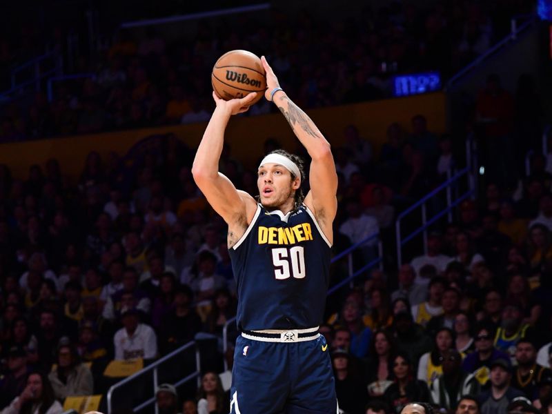 LOS ANGELES, CA - APRIL 27: Aaron Gordon #50 of the Denver Nuggets shoots a three point basket against the Los Angeles Lakers during Round 1 Game 4 of the 2024 NBA Playoffs on April 27, 2024 at Crypto.Com Arena in Los Angeles, California. NOTE TO USER: User expressly acknowledges and agrees that, by downloading and/or using this Photograph, user is consenting to the terms and conditions of the Getty Images License Agreement. Mandatory Copyright Notice: Copyright 2024 NBAE (Photo by Adam Pantozzi/NBAE via Getty Images)