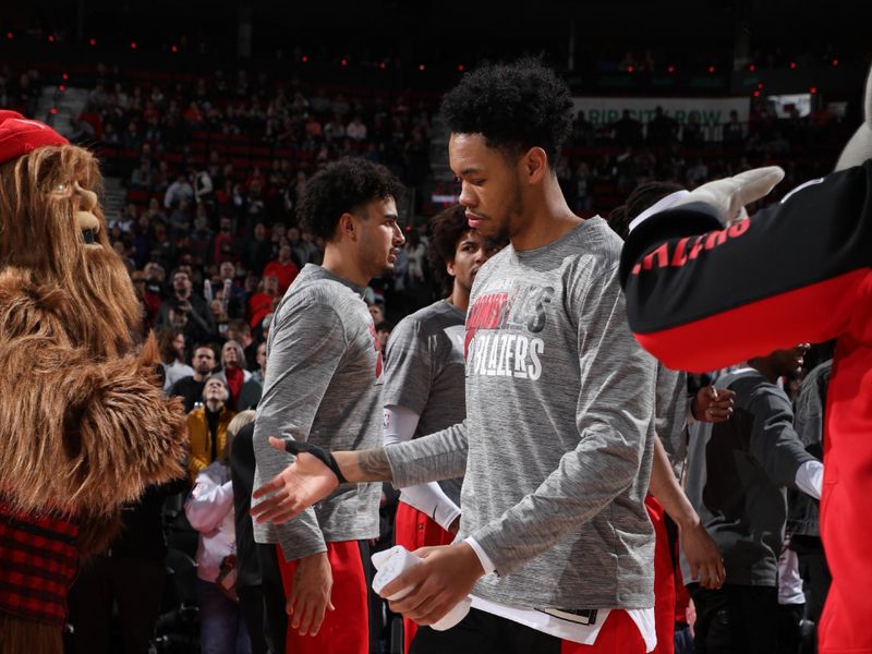 PORTLAND, OR - MARCH 8:  Anfernee Simons #1 of the Portland Trail Blazers walks on the court during player introductions on March 8, 2024 at the Moda Center Arena in Portland, Oregon. NOTE TO USER: User expressly acknowledges and agrees that, by downloading and or using this photograph, user is consenting to the terms and conditions of the Getty Images License Agreement. Mandatory Copyright Notice: Copyright 2024 NBAE (Photo by Cameron Browne/NBAE via Getty Images)