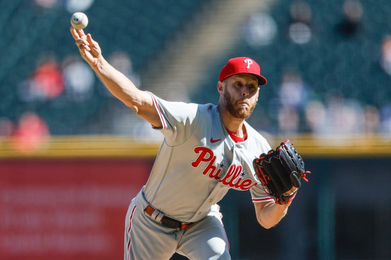 Apr 18, 2023; Chicago, Illinois, USA; Philadelphia Phillies starting pitcher Zack Wheeler (45) delivers against the Chicago White Sox during the first inning of game one of the doubleheader at Guaranteed Rate Field. Mandatory Credit: Kamil Krzaczynski-USA TODAY Sports