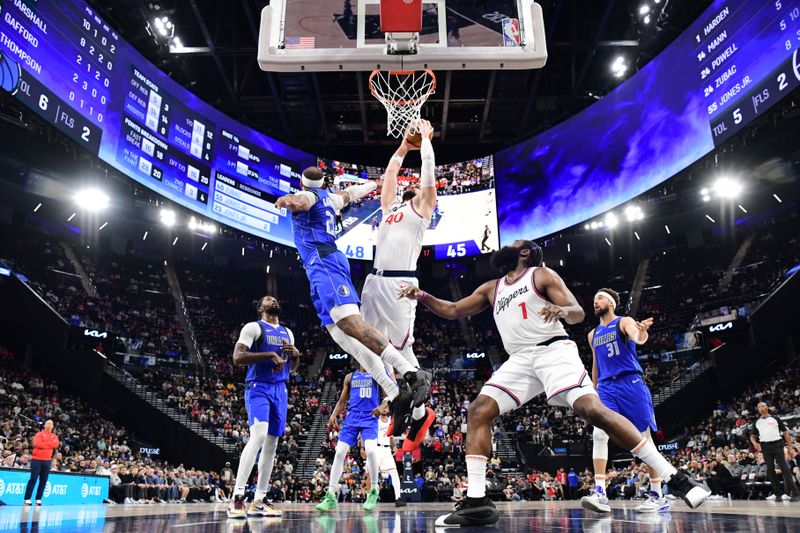 INGLEWOOD, CA - OCTOBER 14: Ivica Zubac #40 of the LA Clippers drives to the basket during the game against the Dallas Mavericks during a NBA Preseason game on October 14, 2024 at the Intuit Dome in Inglewood, California. NOTE TO USER: User expressly acknowledges and agrees that, by downloading and/or using this Photograph, user is consenting to the terms and conditions of the Getty Images License Agreement. Mandatory Copyright Notice: Copyright 2024 NBAE (Photo by Adam Pantozzi/NBAE via Getty Images)