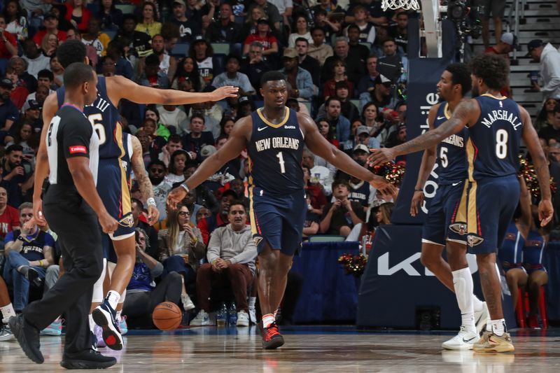 NEW ORLEANS, LA - MARCH 13: Zion Williamson #1 of the New Orleans Pelicans high fives teammates during the game against the Cleveland Cavaliers on March 13, 2024 at the Smoothie King Center in New Orleans, Louisiana. NOTE TO USER: User expressly acknowledges and agrees that, by downloading and or using this Photograph, user is consenting to the terms and conditions of the Getty Images License Agreement. Mandatory Copyright Notice: Copyright 2024 NBAE (Photo by Layne Murdoch Jr./NBAE via Getty Images)