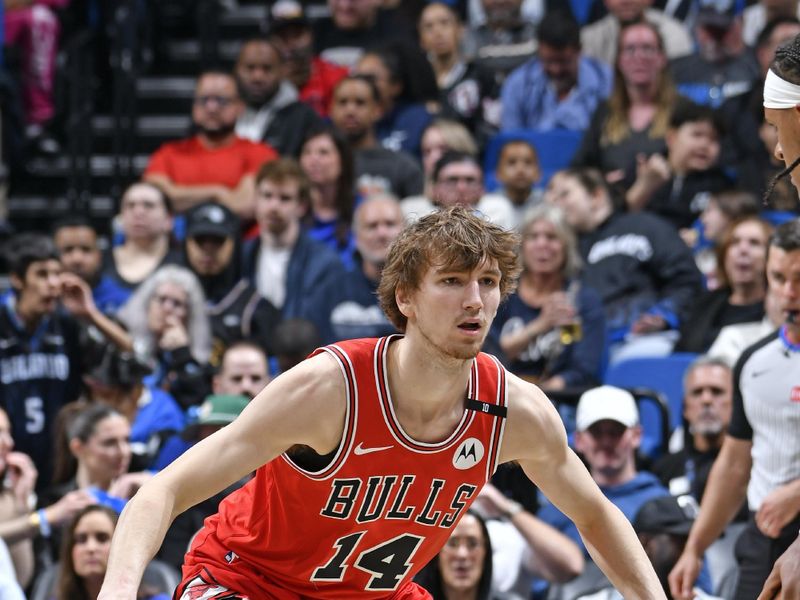 ORLANDO, FL - MARCH 6: Matas Buzelis #14 of Chicago Bulls plays defense during the game against the Orlando Magic on March 6, 2025 at Kia Center in Orlando, Florida. NOTE TO USER: User expressly acknowledges and agrees that, by downloading and or using this photograph, User is consenting to the terms and conditions of the Getty Images License Agreement. Mandatory Copyright Notice: Copyright 2025 NBAE (Photo by Fernando Medina/NBAE via Getty Images)