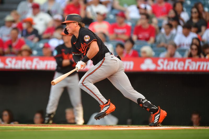 May 10, 2025; Anaheim, California, USA; Baltimore Orioles second baseman Jackson Holliday (7) hits a single against the Los Angeles Angels during the first inning at Angel Stadium. Mandatory Credit: Gary A. Vasquez-Imagn Images
