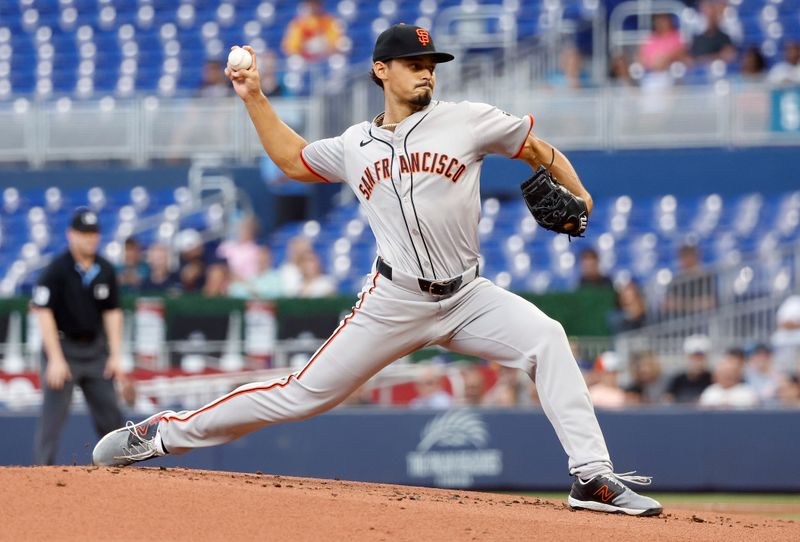 Apr 16, 2024; Miami, Florida, USA;  San Francisco Giants starting pitcher Jordan Hicks (12) delivers a pitch against the Miami Marlins in the first inning at loanDepot Park. Mandatory Credit: Rhona Wise-USA TODAY Sports