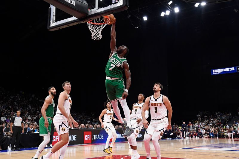 ABU DHABI, UAE - OCTOBER 4: Jaylen Brown #7 of the Boston Celtics dunks the ball during the game against the Denver Nuggets during the 2024 Global Games on October 4, 2024 at the Etihad Arena in Abu Dhabi, United Arab Emirates. NOTE TO USER: User expressly acknowledges and agrees that, by downloading and/or using this Photograph, user is consenting to the terms and conditions of the Getty Images License Agreement. Mandatory Copyright Notice: Copyright 2024 NBAE (Photo by Brian Babineau/NBAE via Getty Images)