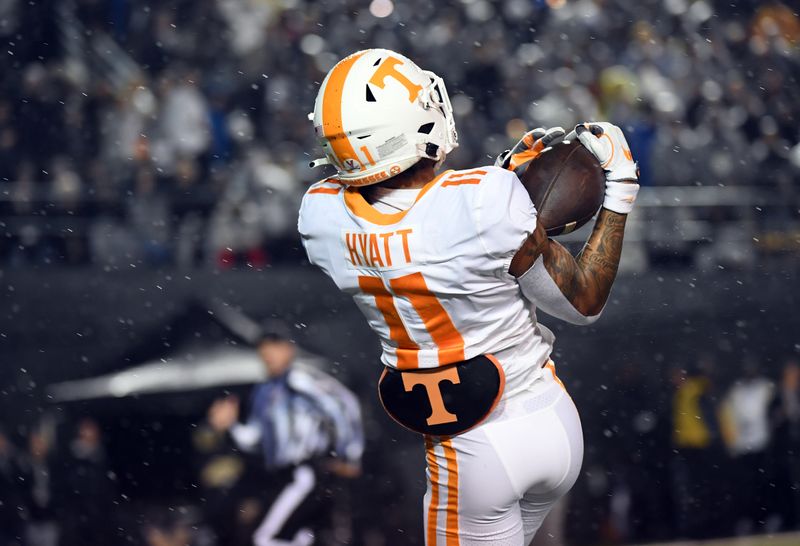 Nov 26, 2022; Nashville, Tennessee, USA; Tennessee Volunteers wide receiver Jalin Hyatt (11) catches a pass for a first down during the first half against the Vanderbilt Commodores at FirstBank Stadium. Mandatory Credit: Christopher Hanewinckel-USA TODAY Sports