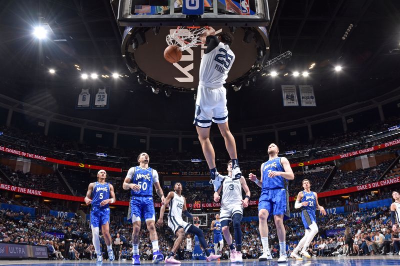 ORLANDO, FL - MARCH 30: Maozinha Pereira #25 of the Memphis Grizzlies dunks the ball during the game against the Orlando Magic on March 30, 2024 at the Kia Center in Orlando, Florida. NOTE TO USER: User expressly acknowledges and agrees that, by downloading and or using this photograph, User is consenting to the terms and conditions of the Getty Images License Agreement. Mandatory Copyright Notice: Copyright 2024 NBAE (Photo by Fernando Medina/NBAE via Getty Images)