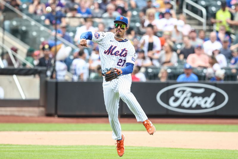 Jun 30, 2024; New York City, New York, USA;  New York Mets third baseman Mark Vientos (27) makes a running throw to first base for an assist in the seventh inning against the Houston Astros at Citi Field. Mandatory Credit: Wendell Cruz-USA TODAY Sports