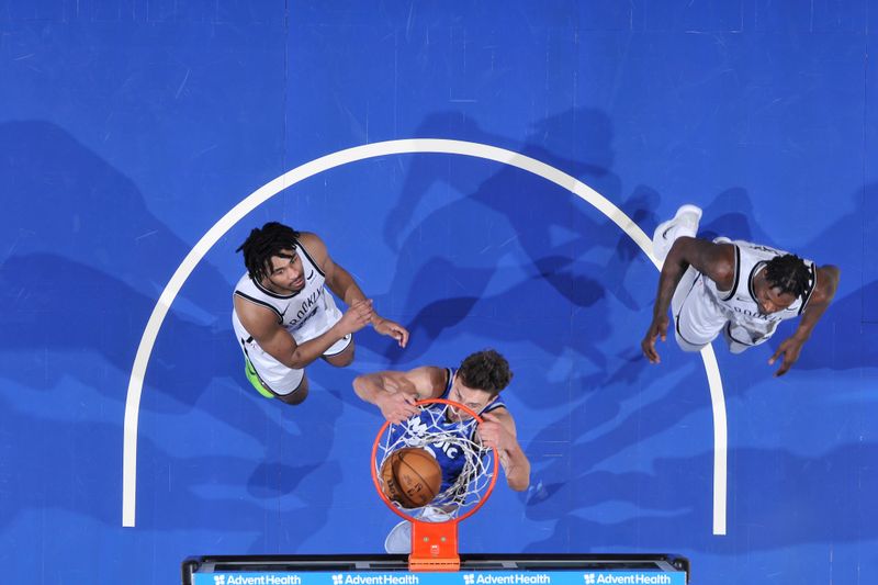 ORLANDO, FL - MARCH 13: Franz Wagner #22 of the Orlando Magic dunks the ball during the game against the Brooklyn Nets on March 13, 2024 at the Kia Center in Orlando, Florida. NOTE TO USER: User expressly acknowledges and agrees that, by downloading and or using this photograph, User is consenting to the terms and conditions of the Getty Images License Agreement. Mandatory Copyright Notice: Copyright 2024 NBAE (Photo by Fernando Medina/NBAE via Getty Images)