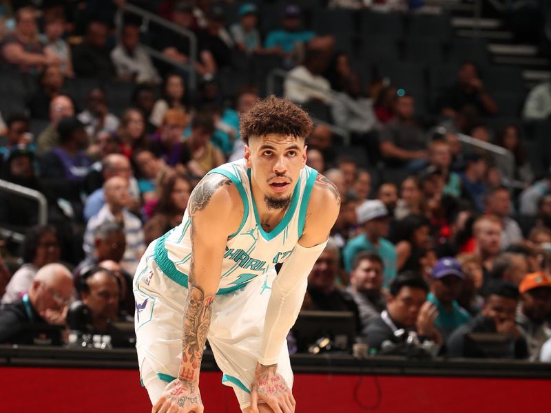 CHARLOTTE, NC - OCTOBER 30: LaMelo Ball #1 of the Charlotte Hornets looks on during the game against the Toronto Raptors on October 30, 2024 at Spectrum Center in Charlotte, North Carolina. NOTE TO USER: User expressly acknowledges and agrees that, by downloading and or using this photograph, User is consenting to the terms and conditions of the Getty Images License Agreement. Mandatory Copyright Notice: Copyright 2024 NBAE (Photo by Kent Smith/NBAE via Getty Images)