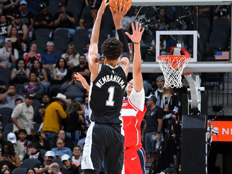 SAN ANTONIO, TX - NOVEMBER 13: Jordan Poole #13 of the Washington Wizards three point basket during the game against the San Antonio Spurs on November 13, 2024 at the Frost Bank Center in San Antonio, Texas. NOTE TO USER: User expressly acknowledges and agrees that, by downloading and or using this photograph, user is consenting to the terms and conditions of the Getty Images License Agreement. Mandatory Copyright Notice: Copyright 2024 NBAE (Photos by Michael Gonzales/NBAE via Getty Images)